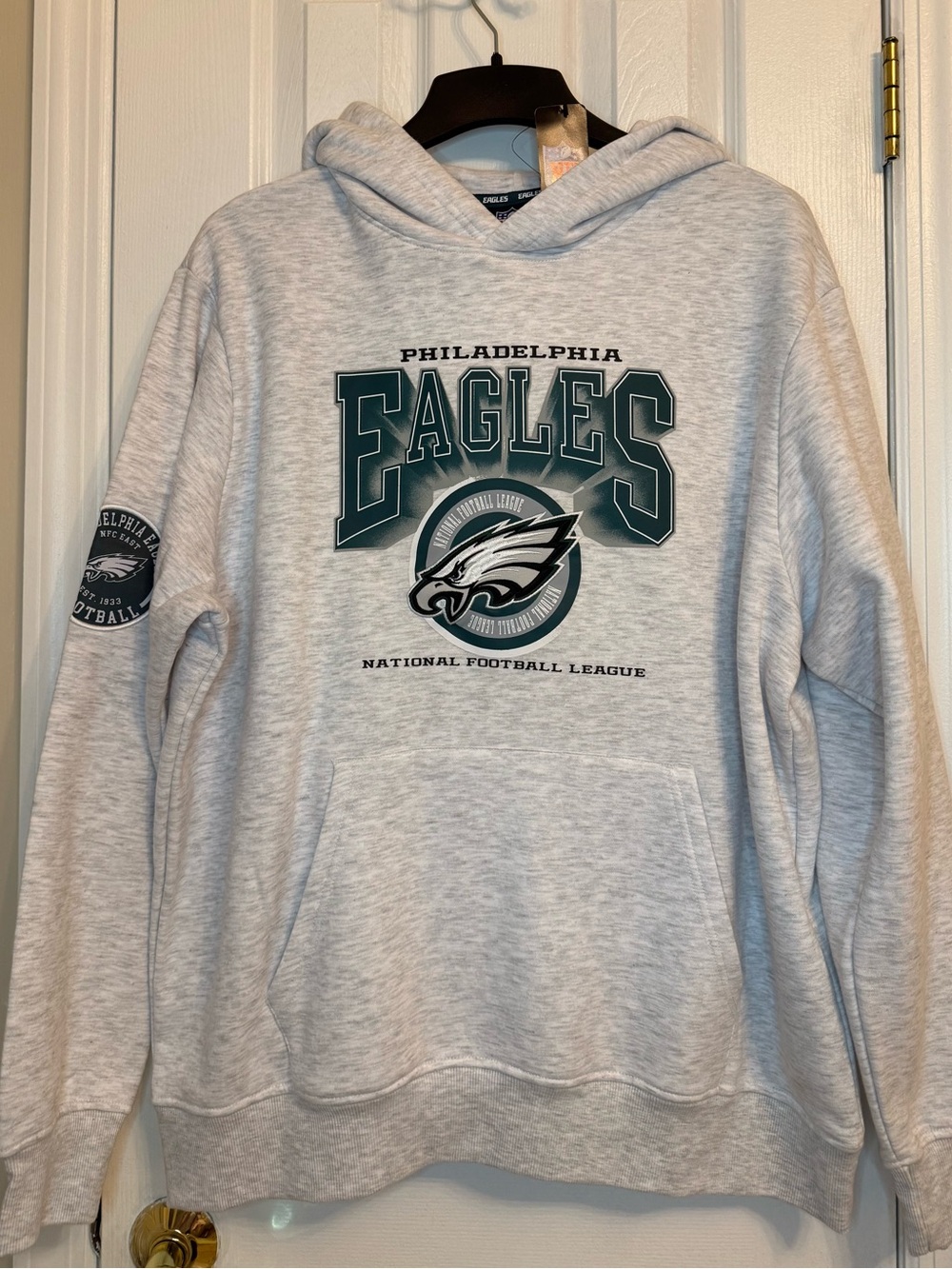 Official NFL Eagles hooded sweatshirt by Primark.
